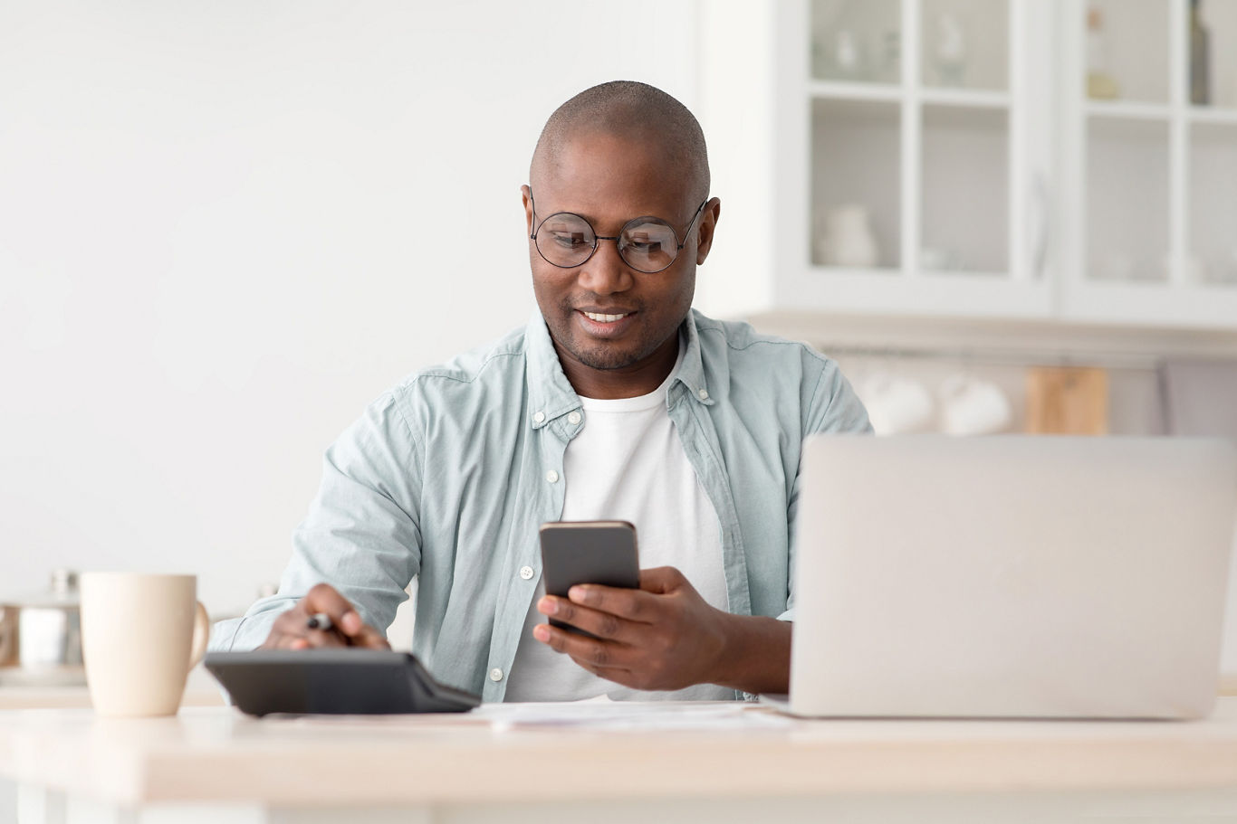 Man Looking at Phone Completing Survey | Blog | Greystar